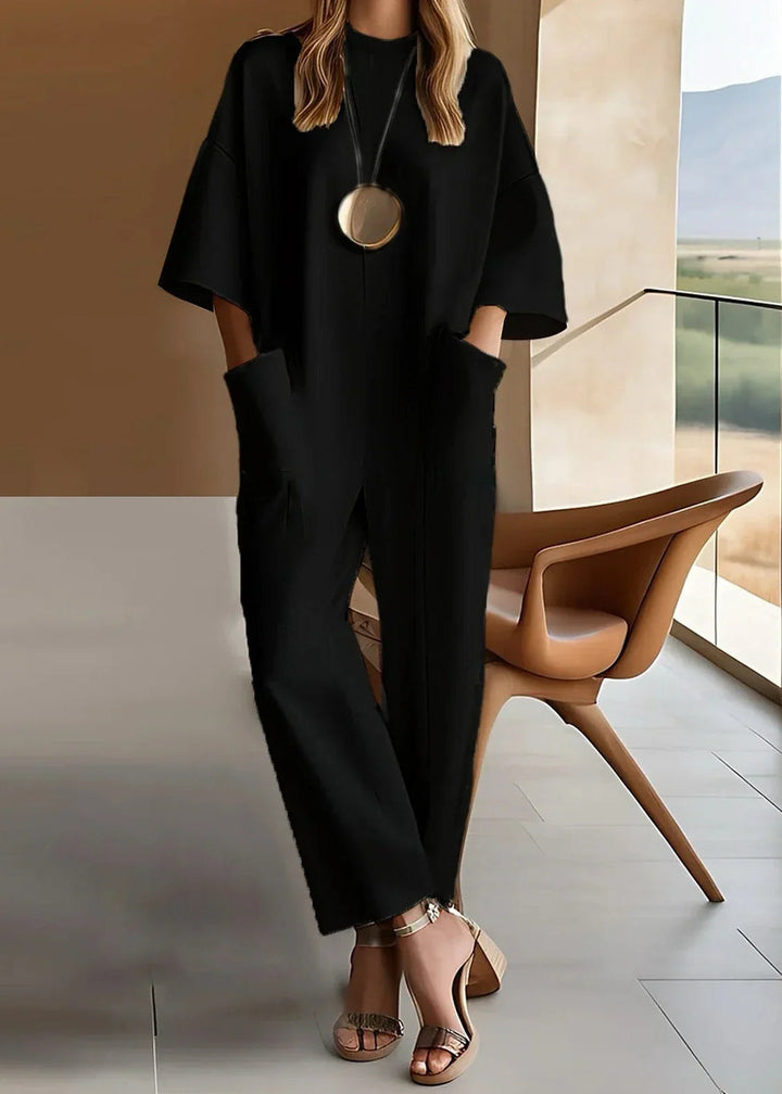 Aria | Dames Korte Mouw Wijde Pijpen Jumpsuit Met Ronde Hals