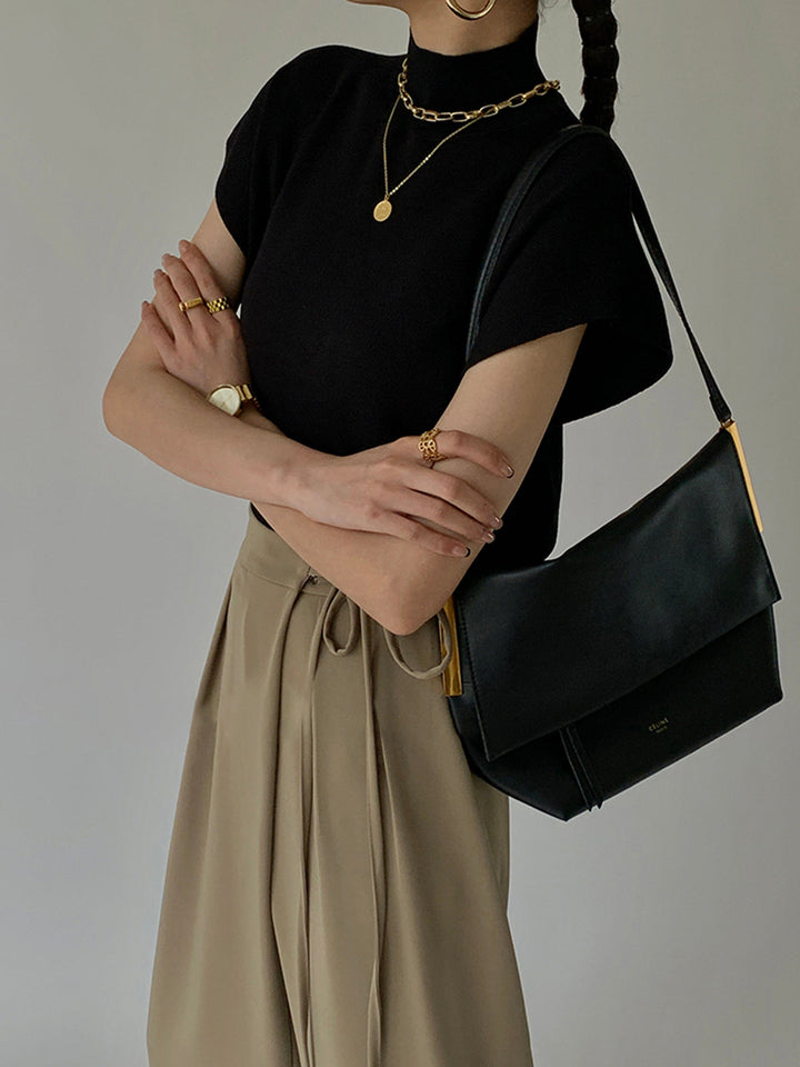 Noira | Dames Mock Neck Mouwloze Top Met Gevoerde Schouders
