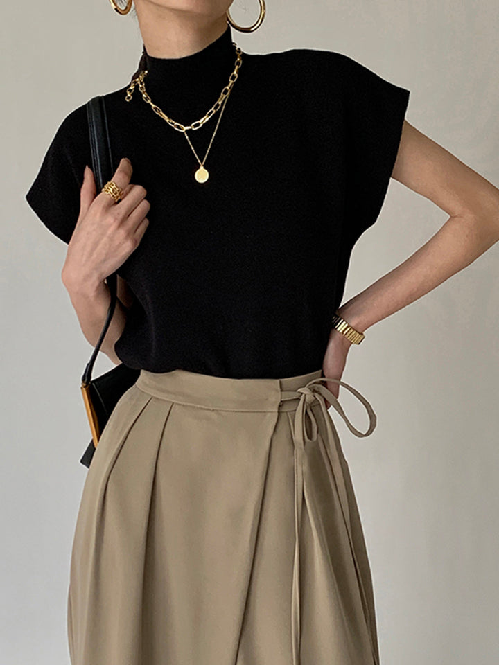 Noira | Dames Mock Neck Mouwloze Top Met Gevoerde Schouders