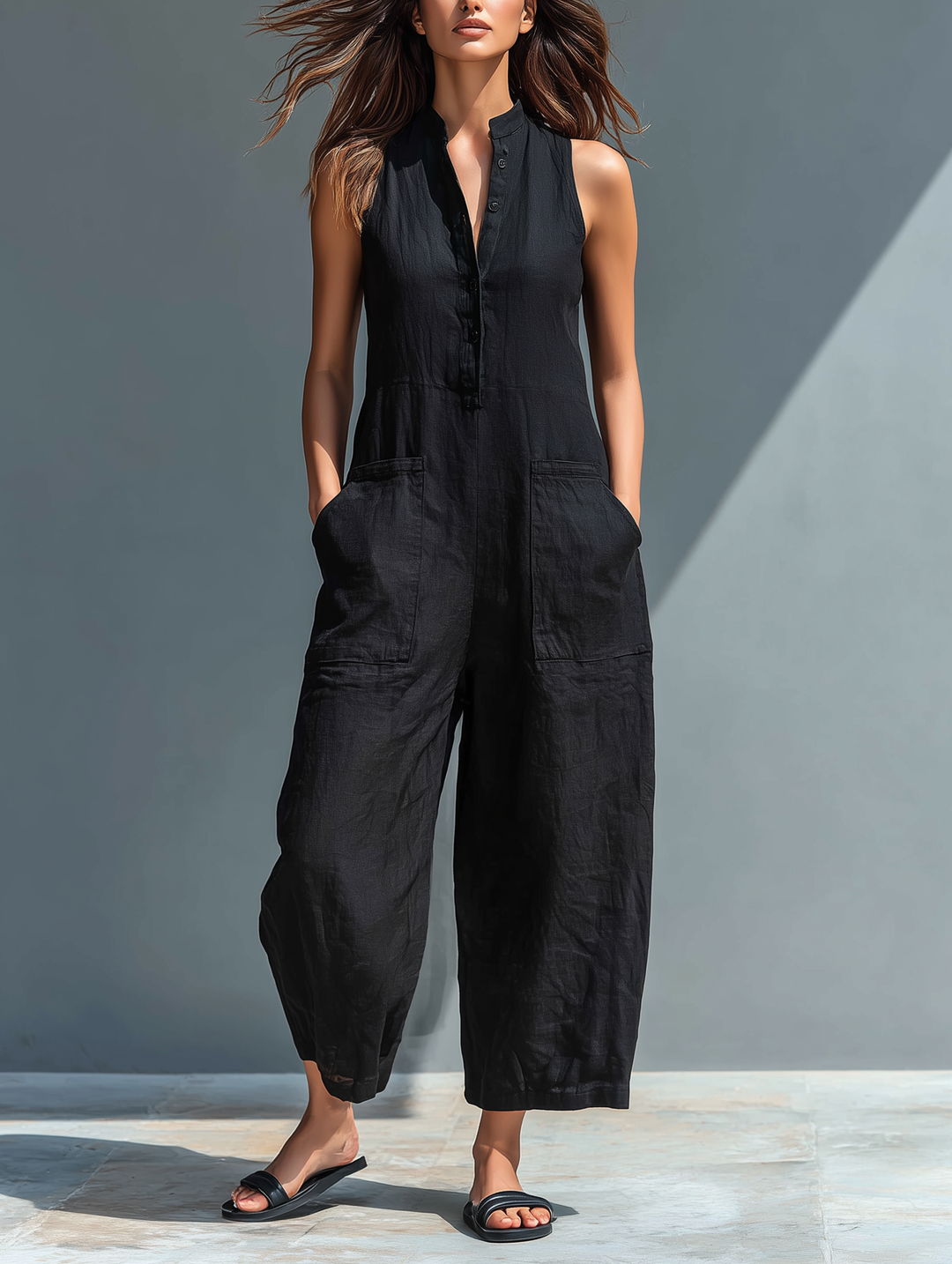 Lysandra | Dames Mouwloze Knop Voor Brede Pijpen Jumpsuit